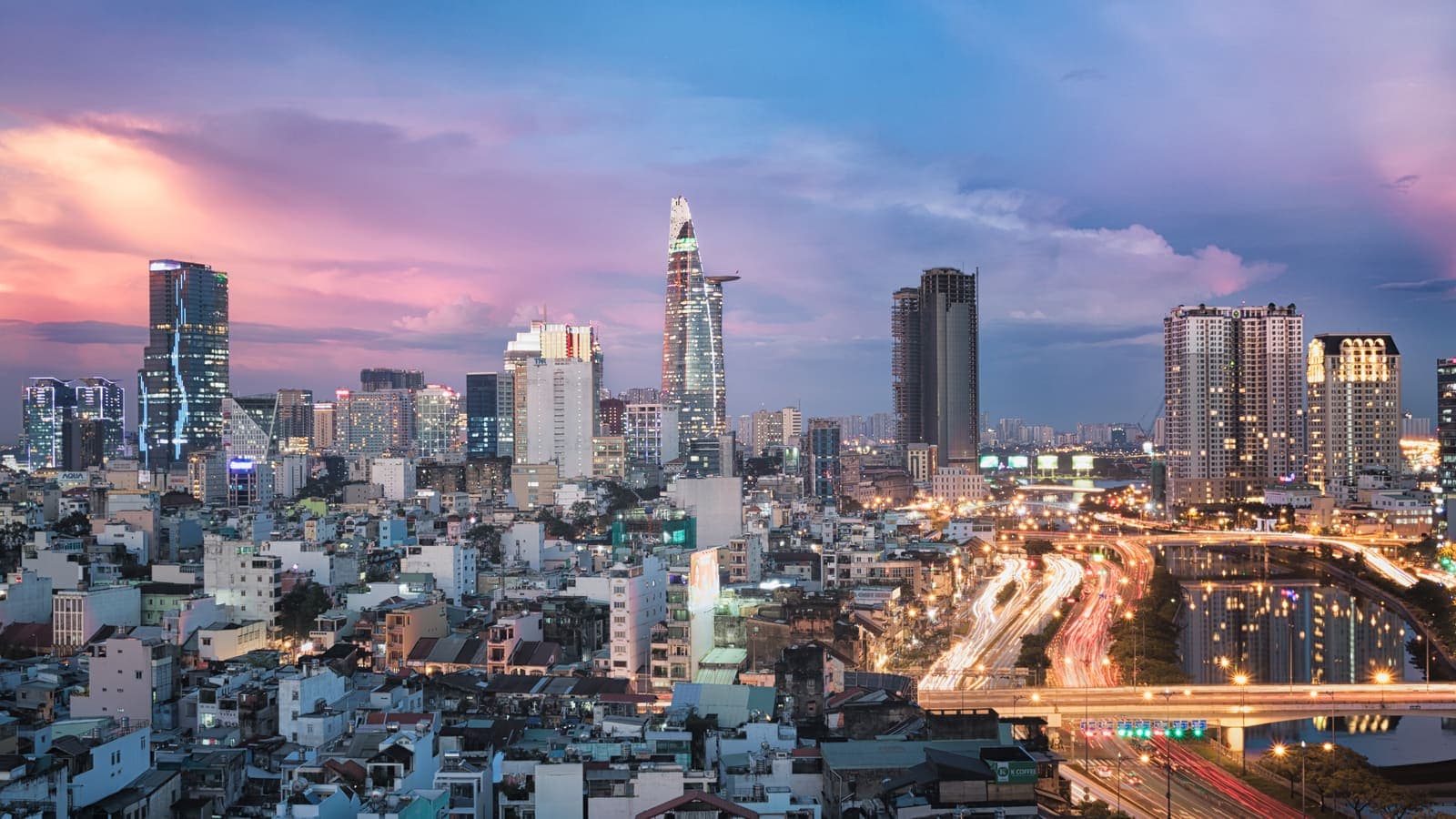 Ho Chi Minh skyline at sunset with the Bitexco Financial Tower
