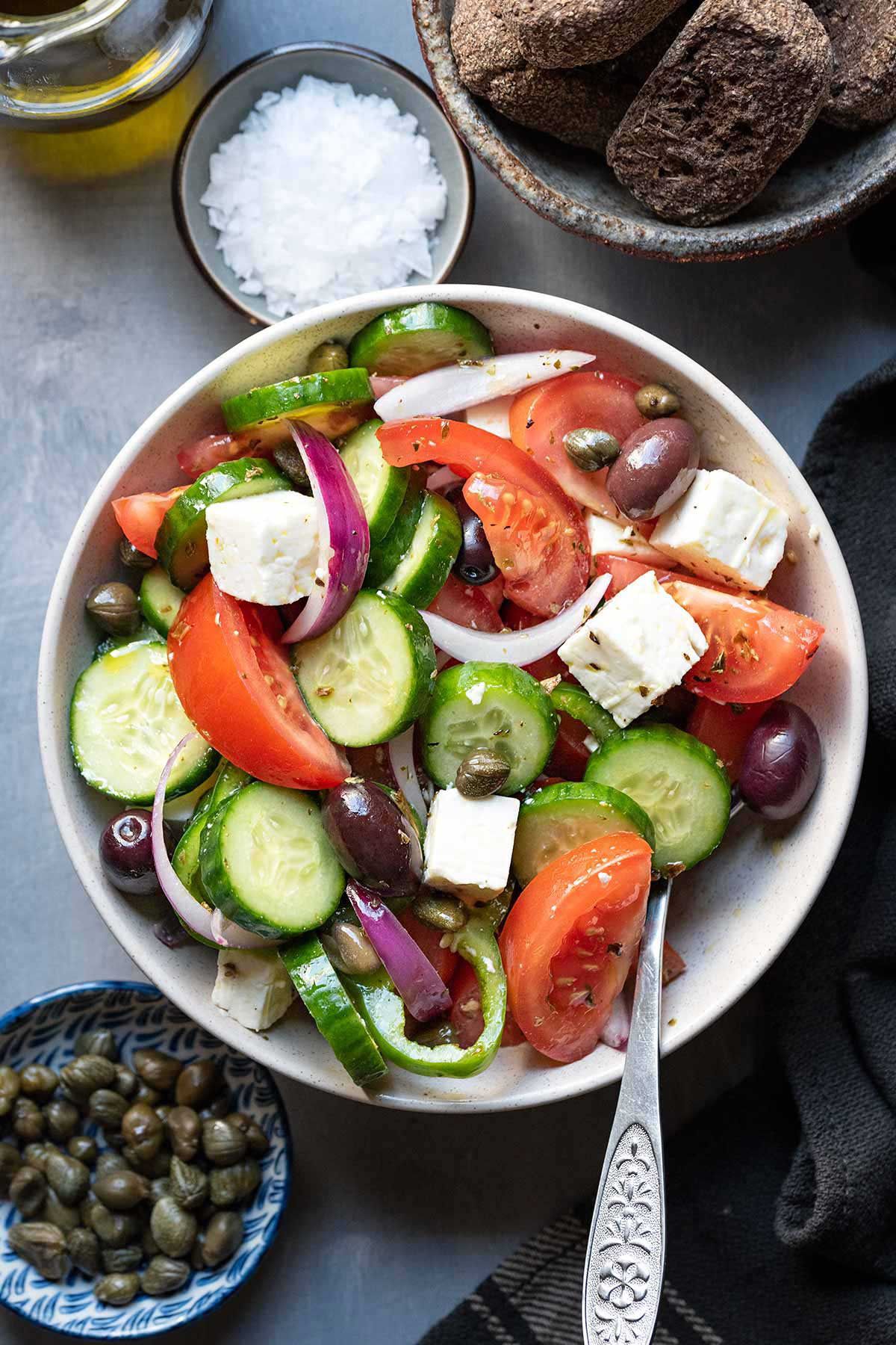 Traditional Greek salad with feta, tomatoes, and olives