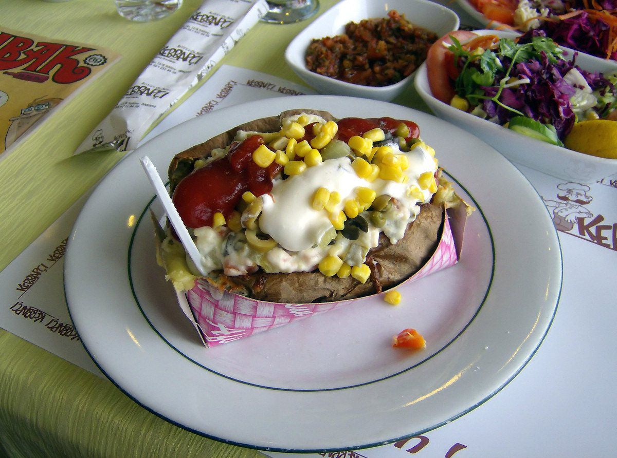 Kumpir stuffed baked potato with colorful toppings