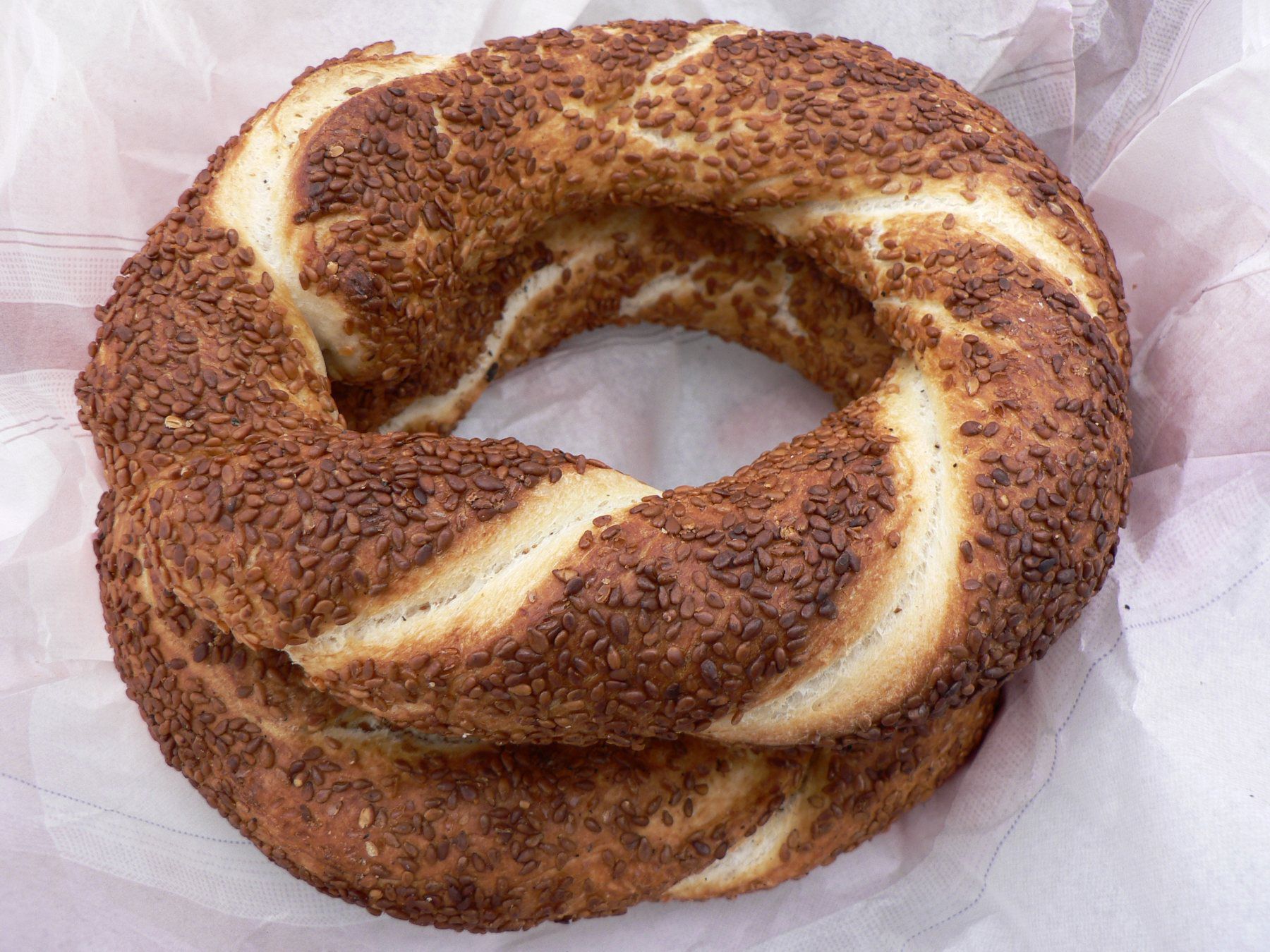 Fresh simit sesame bread rings on a plate