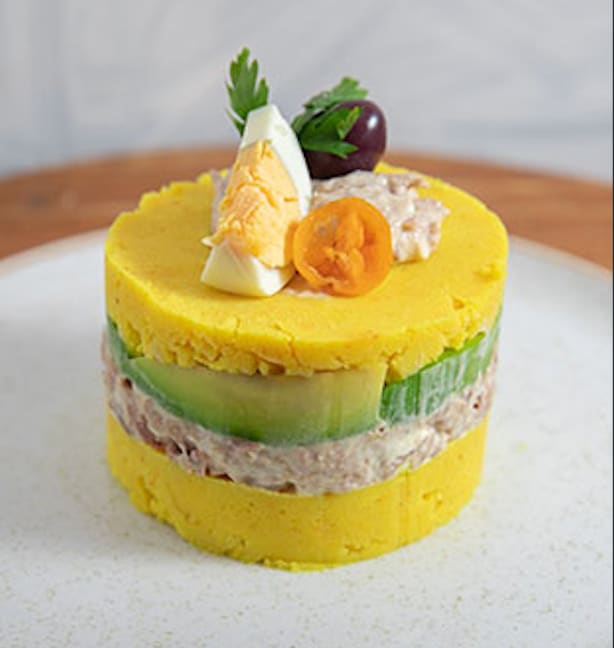 Causa limena layered potato dish in Lima