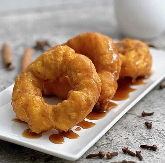 Picarones with syrup in Lima