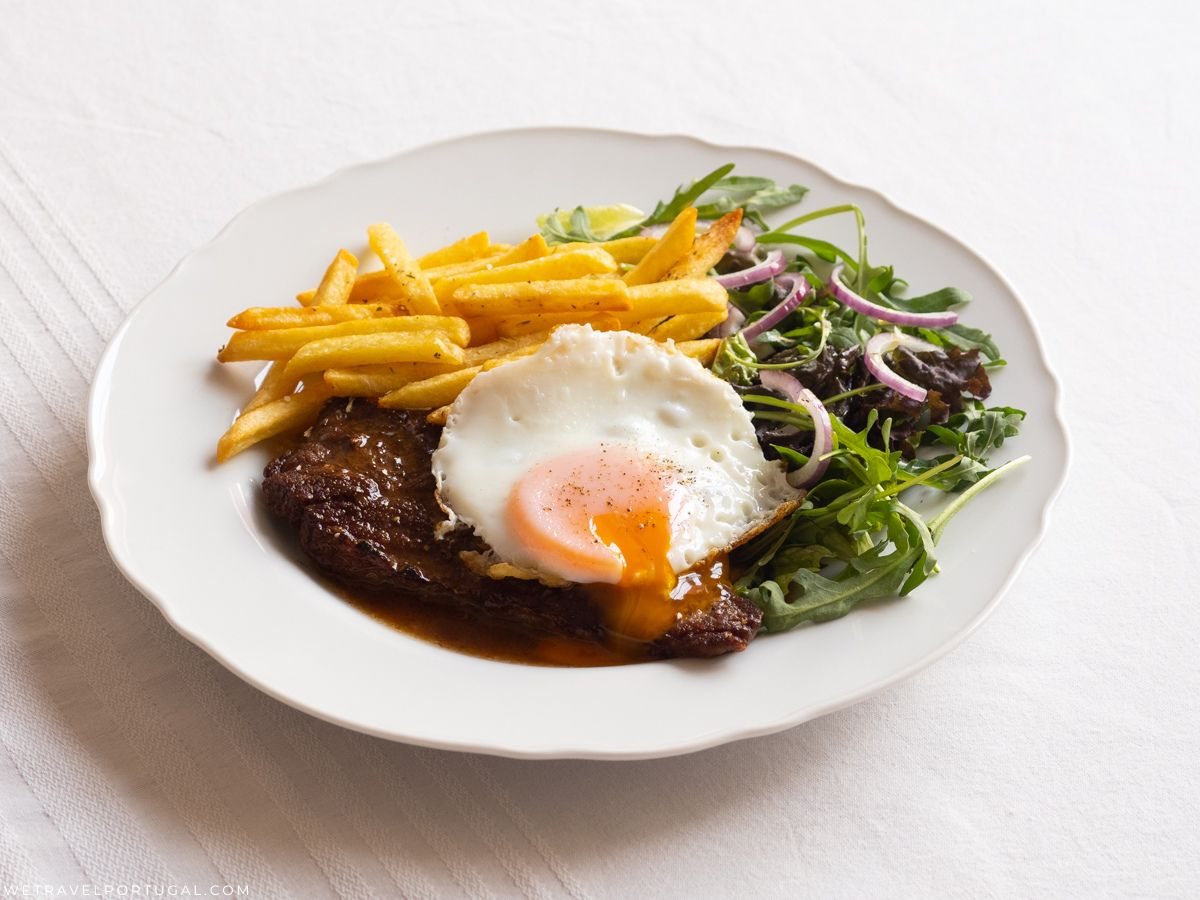 Bitoque Portuguese steak with egg, fries, and rice