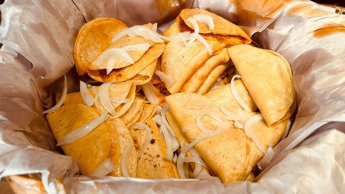 Basket tacos arranged on a plate