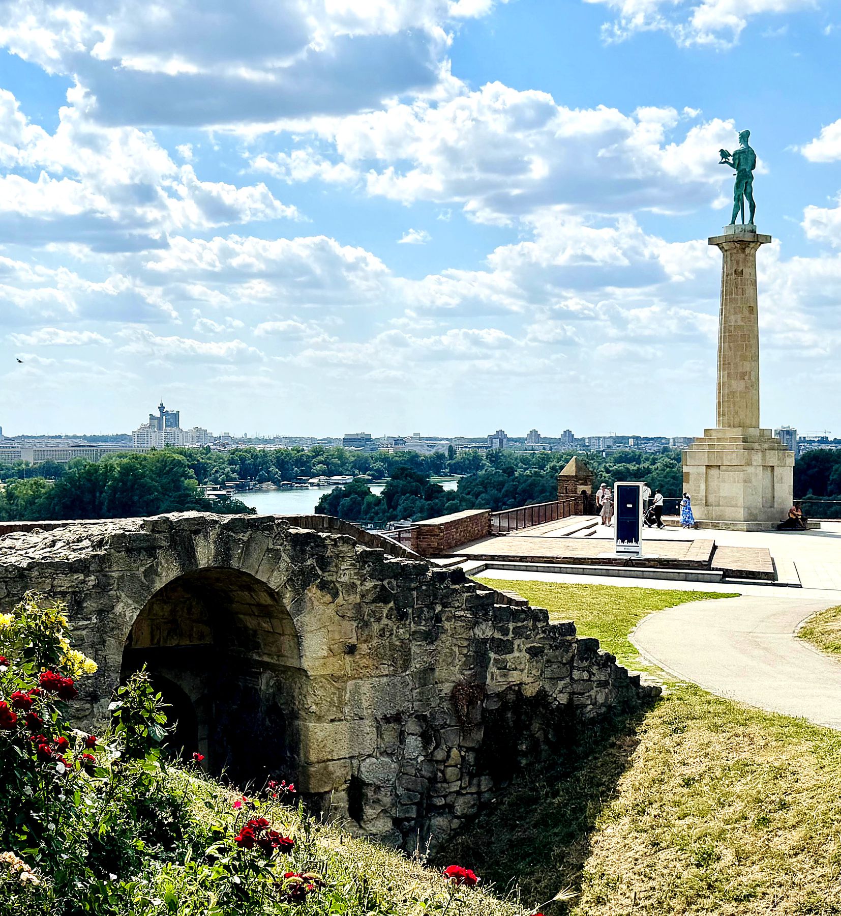 View over Belgrade from Kalemegdan Fortress with the Victor monument and flower beds in the foreground